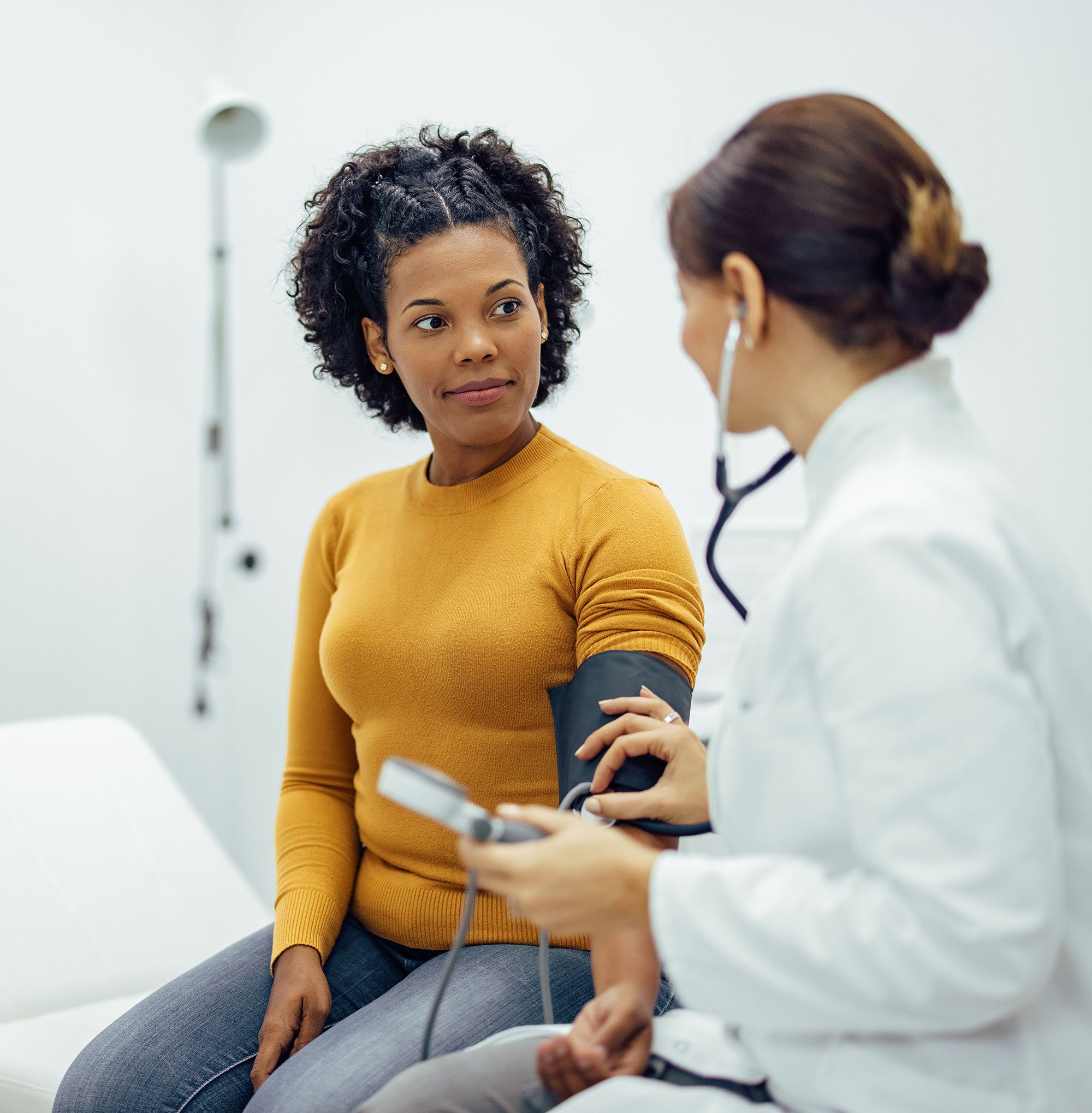 Woman getting a checkup at a doctor's office