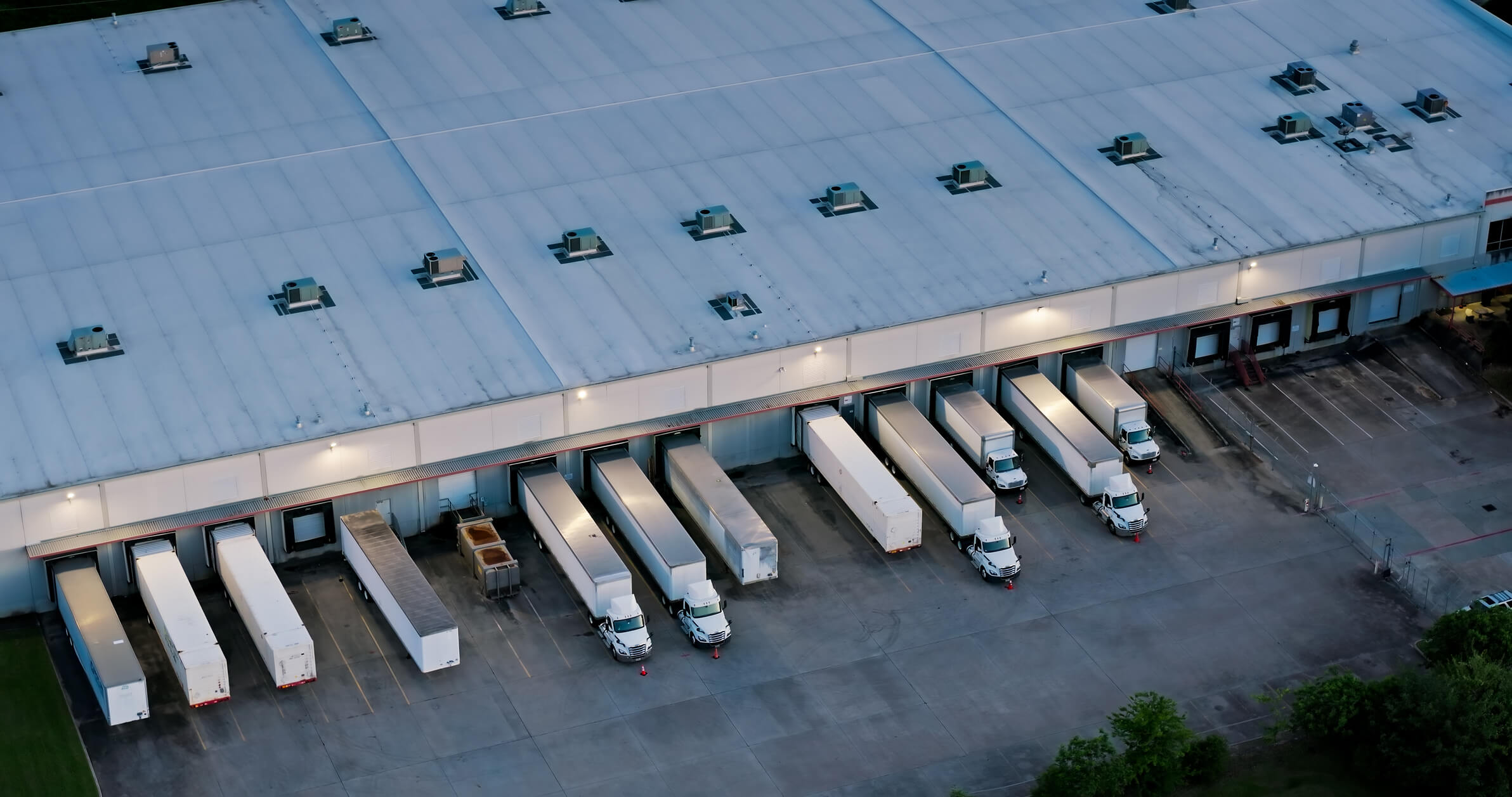 Trucks lined up at a warehouse