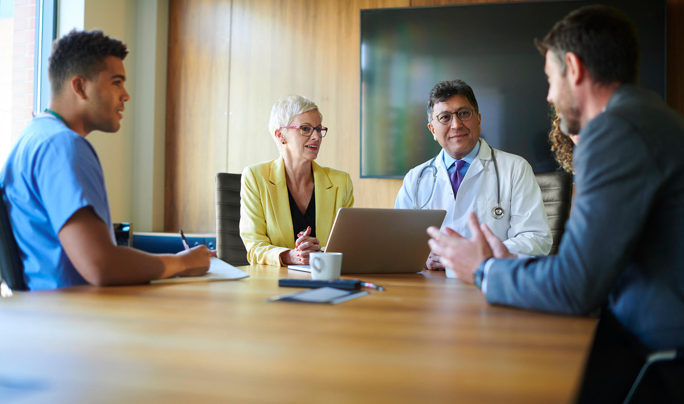 Doctors having a discussion at a table