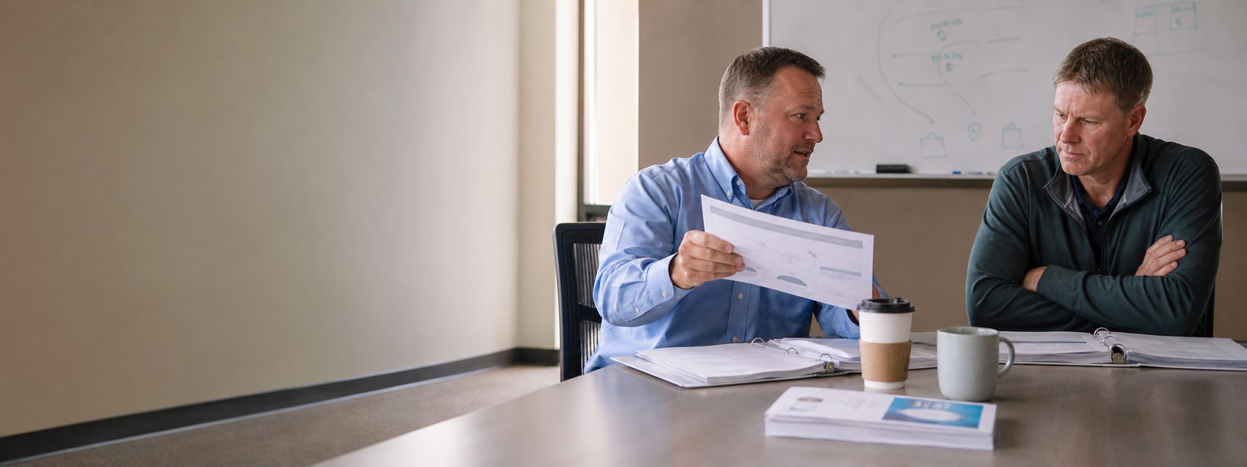 A salesperson delivering a presentation to a prospect